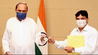 Odisha chief minister Naveen Patnaik receives a digital copy of the state budget for 2022-23 financial year from the state finance minister Niranjan Pujari, during the Monsoon Session of the assembly, in Bhubaneswar on Saturday. (PTI PHOTO.) Odisha chief minister Naveen Patnaik receives a digital copy of the state budget for 2022-23 financial year from the state finance minister Niranjan Pujari, during the Monsoon Session of the assembly, in Bhubaneswar on Saturday. (PTI PHOTO.)