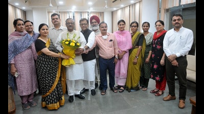 The newly elected members of Panjab University syndicate at the varsity’s administrative block in Chandigarh on Saturday. (Ravi Kumar/HT) The newly elected members of Panjab University syndicate at the varsity’s administrative block in Chandigarh on Saturday. (Ravi Kumar/HT)