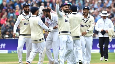 India's Jasprit Bumrah, centre, is congratulated by teammates after dismissing England's Ollie Pope during the second day of the fifth Test (AP)
