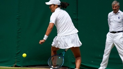 France's Harmony Tan returns to Britain's Katie Boulter during their women's third round singles match on day six of the Wimbledon tennis championships. (AP) France's Harmony Tan returns to Britain's Katie Boulter during their women's third round singles match on day six of the Wimbledon tennis championships. (AP)