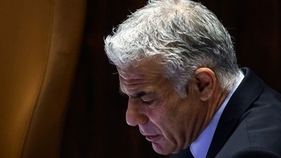 Yair Lapid attends a session at the plenum at the Knesset, Israel's parliament, in Jerusalem.&nbsp; (REUTERS)
