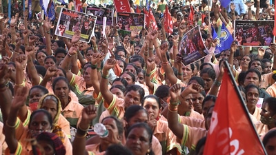 'Pourakarmikas', or safai karamcharis, shout slogans during their strike at Freedom Park in Bengaluru on Friday, July 1, 2022. (PTI Photo/Shailendra Bhojak) (PTI) 'Pourakarmikas', or safai karamcharis, shout slogans during their strike at Freedom Park in Bengaluru on Friday, July 1, 2022. (PTI Photo/Shailendra Bhojak) (PTI)