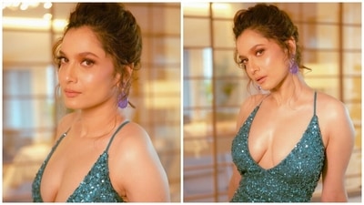 Ankita wore a spaghetti-strapped emerald green dress. It comes adorned with shimmering sequin embellishments, a plunging neckline, backless details with crisss-cross straps, bodycon fitting accentuating her curves, floor-grazing hem length, and a risqué thigh-baring slit on the side. (Instagram) Ankita wore a spaghetti-strapped emerald green dress. It comes adorned with shimmering sequin embellishments, a plunging neckline, backless details with crisss-cross straps, bodycon fitting accentuating her curves, floor-grazing hem length, and a risqué thigh-baring slit on the side. (Instagram)