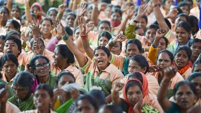 On Friday, at least 15,000 pourakarmikas of Bruhat Bengaluru Mahanagara Palike (BBMP) began an indefinite strike at Freedom Park, demanding their jobs be made permanent and better salary to take care of their families. (PTI) On Friday, at least 15,000 pourakarmikas of Bruhat Bengaluru Mahanagara Palike (BBMP) began an indefinite strike at Freedom Park, demanding their jobs be made permanent and better salary to take care of their families. (PTI)