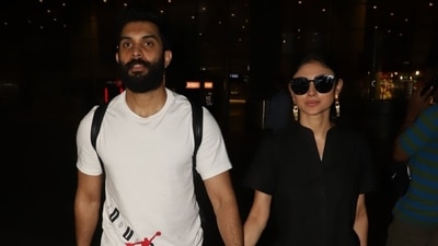 One can always expect Mouni Roy to serve fashion goals, whether she is walking the red carpet, attending an event or travelling around the world with her husband, Suraj Nambiar. Moreover, the Brahmastra actor's off-duty wardrobe is also full of swoon-worthy pieces that deserve to be on your wishlist. For instance, Mouni's all-black airport look. Her pick: A black shirt and pants set teamed with trendy earrings and a printed bag to add a pop of colour to her jet-set attire. (HT Photo/Varinder Chawla) One can always expect Mouni Roy to serve fashion goals, whether she is walking the red carpet, attending an event or travelling around the world with her husband, Suraj Nambiar. Moreover, the Brahmastra actor's off-duty wardrobe is also full of swoon-worthy pieces that deserve to be on your wishlist. For instance, Mouni's all-black airport look. Her pick: A black shirt and pants set teamed with trendy earrings and a printed bag to add a pop of colour to her jet-set attire. (HT Photo/Varinder Chawla)