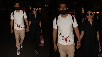 Mouni's husband complemented her in a printed white T-shirt featuring a round neckline, half sleeves and body-skimming fit. Suraj teamed it with beige pants, beige lace-up sneakers, a metallic watch, a rugged beard and a back-swept hairdo. (HT Photo/Varinder Chawla) Mouni's husband complemented her in a printed white T-shirt featuring a round neckline, half sleeves and body-skimming fit. Suraj teamed it with beige pants, beige lace-up sneakers, a metallic watch, a rugged beard and a back-swept hairdo. (HT Photo/Varinder Chawla)
