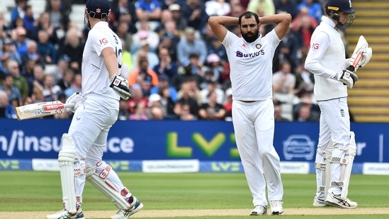 India's Mohammed Shami, centre, reacts after bowling during the second day of the fifth Test(AP)