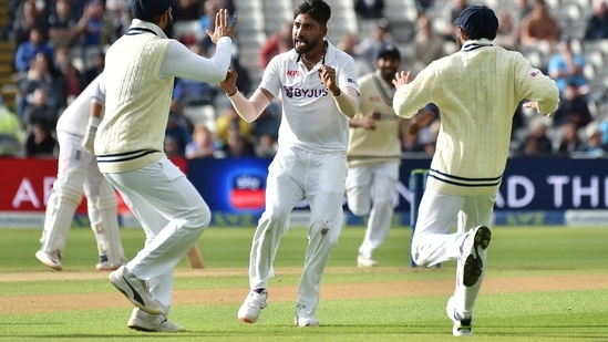 India's Mohammad Siraj celebrates the dismissal of England's Joe Root during the second day of the fifth Test(AP)