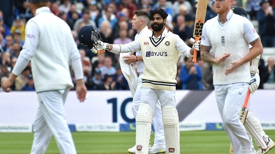 India's Ravindra Jadeja centre celebrates after reaching a century during the second day of the fifth Test(AP)