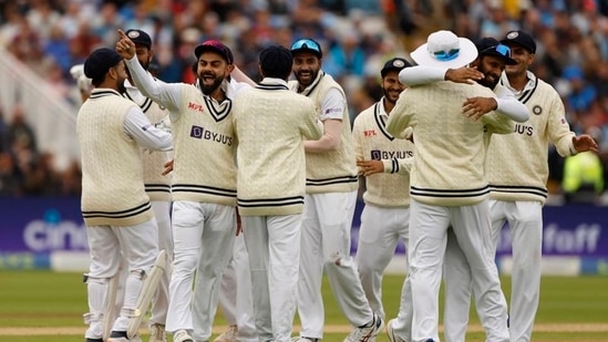 India's Jasprit Bumrah celebrates with teammates after taking the wicket of England's Ollie Pope(Action Images via Reuters)