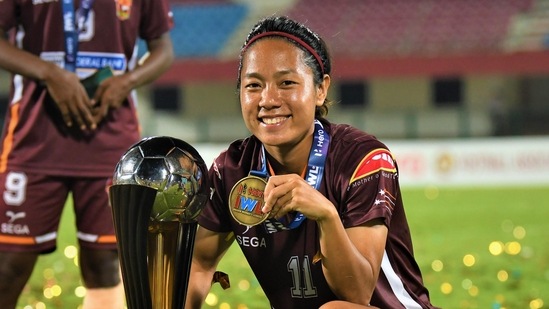 Dangmei Grace with the IWL trophy in Bhubaneswar in May.