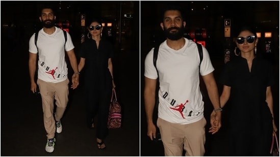 Mouni's husband complemented her in a printed white T-shirt featuring a round neckline, half sleeves and body-skimming fit. Suraj teamed it with beige pants, beige lace-up sneakers, a metallic watch, a rugged beard and a back-swept hairdo.(HT Photo/Varinder Chawla)