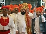Maharashtra chief minister Eknath Shinde shows victory sign as he arrives to attend the special session of the Assembly in Mumbai on Sunday. (ANI)