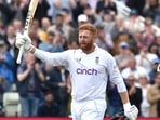 England's Jonny Bairstow celebrates after reaching a century during the third day of the fifth Test(AP)