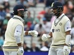 IND vs ENG Live Score: India's Cheteshwar Pujara, right, touch gloves with India's Rishabh Pant(AP)