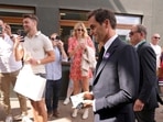 Switzerland's Roger Federer walks outside Centre Court on day seven of the Wimbledon tennis championships. Switzerland's Roger Federer walks outside Centre Court on day seven of the Wimbledon tennis championships.
