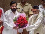 Mumbai: Newly elected Maharashtra Chief Minister Eknath Shinde being presented a bouquet by Governor Bhagat Singh Koshyari during his oath-taking ceremony, at Raj Bhavan in Mumbai, (PTI)