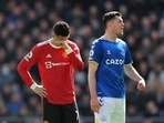 Manchester United's Cristiano Ronaldo reacts as Everton's Michael Keane looks on