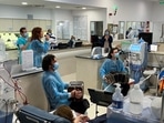 Bandoneonists Abril Farolini, 22, Ramiro Hernndez, 35, and singer Paola Larrama, 37, perform at the dialysis room in the Diaverum Center for kidney patients, as part of the Hospital Tango project, in Montevideo. (Photo by Lucia LACURCIA / AFP)(AFP) Bandoneonists Abril Farolini, 22, Ramiro Hernndez, 35, and singer Paola Larrama, 37, perform at the dialysis room in the Diaverum Center for kidney patients, as part of the Hospital Tango project, in Montevideo. (Photo by Lucia LACURCIA / AFP)(AFP)