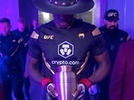 UFC champ emulates WWE legend The Undertaker(Twitter) UFC champ emulates WWE legend The Undertaker(Twitter)