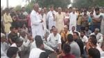 Villagers blocking the national highway after three people, including a woman and her son, were killed after a truck hit a cycle and a motorcycle in Bhiwani on Sunday. (HT Photo) Villagers blocking the national highway after three people, including a woman and her son, were killed after a truck hit a cycle and a motorcycle in Bhiwani on Sunday. (HT Photo)