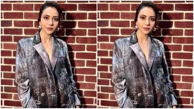 Rakul Preet decked up in a grey bra and layered it with a grey blazer with translucent details, the blazer featured lapel collars and buttons. She completed her look for the day in matching grey trousers. (Instagram/@rakulpreet)