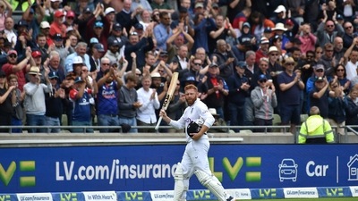 England's Jonny Bairstow returns to the pavilion after being dismissed by India's Mohammed Shami during the third day of the fifth Test (AP)