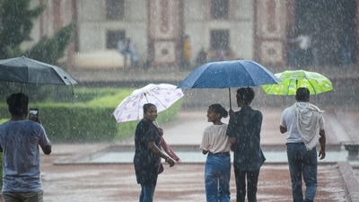 Visitors at Humayun's Tomb during a brief spell of Rains in New Delhi, on July 3, 2022. (Sanchit Khanna/HT Photo) Visitors at Humayun's Tomb during a brief spell of Rains in New Delhi, on July 3, 2022. (Sanchit Khanna/HT Photo)