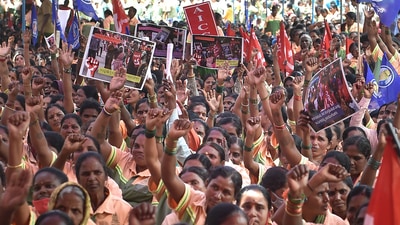 Bengaluru: Pourakarmikas (safai karamchari) shout slogans during their statewide indefinite strike demanding regularization of their services, dignified working conditions, post-retirement benefits and other welfare measures, at Freedom Park in Bengaluru, Friday, July 1, 2022. (PTI) Bengaluru: Pourakarmikas (safai karamchari) shout slogans during their statewide indefinite strike demanding regularization of their services, dignified working conditions, post-retirement benefits and other welfare measures, at Freedom Park in Bengaluru, Friday, July 1, 2022. (PTI)