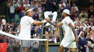 Australia's Nick Kyrgios with Greece's Stefanos Tsitsipas after winning their third round match (REUTERS)