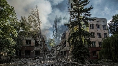 FILE PHOTO: Smoke rises over the remains of a building destroyed by a military strike, as Russia's attack on Ukraine continues, in Lysychansk, Luhansk region, Ukraine June 17, 2022. REUTERS/Oleksandr Ratushniak/File Photo (REUTERS)