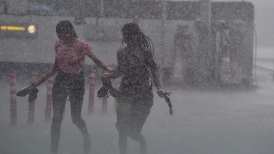 Pedestrians enjoy heavy rains outside Shivaji Metro station in New Delhi, on July 3, 2022. (Raj K Raj/HT Photo) Pedestrians enjoy heavy rains outside Shivaji Metro station in New Delhi, on July 3, 2022. (Raj K Raj/HT Photo)