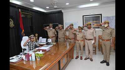Twelve-year-old Harsh Dubey as ADG Prayagraj for a day on Sunday. (HT)