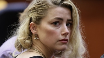 Amber Heard waits before the jury said that they believe she defamed ex-husband Johnny Depp. (Reuters) (REUTERS)
