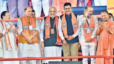 (From left) Union home minister Amit Shah, defence minister Rajnath Singh and BJP president JP Nadda at a public meeting in Hyderabad on Sunday (PTI)