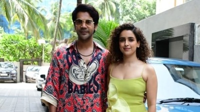 Rajkummar Rao and Sanya Malhotra, who will soon be seen together in a new film, HIT The First Case, brought their fashion A-game during an outing in Mumbai today. The two actors slipped into stylish fits for the occasion and served casual-chic vibes. While Rajkummar wore a baggy shirt and pants set, Sanya opted for a classy knee-length dress. Scroll ahead to check out their photos. (HT Photo/Varinder Chawla) Rajkummar Rao and Sanya Malhotra, who will soon be seen together in a new film, HIT The First Case, brought their fashion A-game during an outing in Mumbai today. The two actors slipped into stylish fits for the occasion and served casual-chic vibes. While Rajkummar wore a baggy shirt and pants set, Sanya opted for a classy knee-length dress. Scroll ahead to check out their photos. (HT Photo/Varinder Chawla)