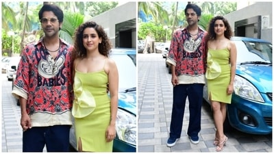 Rajkummar, on the other hand, complemented Sanya in a red, blue and white printed collared shirt featuring a button-up front, drop shoulders, baggy silhouette, and quarter-length sleeves. (HT Photo/Varinder Chawla) Rajkummar, on the other hand, complemented Sanya in a red, blue and white printed collared shirt featuring a button-up front, drop shoulders, baggy silhouette, and quarter-length sleeves. (HT Photo/Varinder Chawla)
