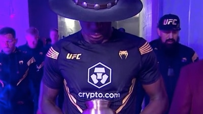 UFC champ emulates WWE legend The Undertaker (Twitter) UFC champ emulates WWE legend The Undertaker (Twitter)