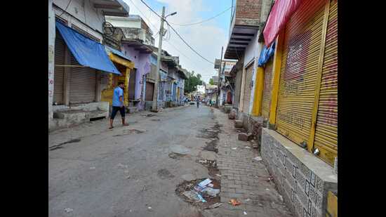 The market in Pinahat closed on Sunday in protest against the double murder. (HT)