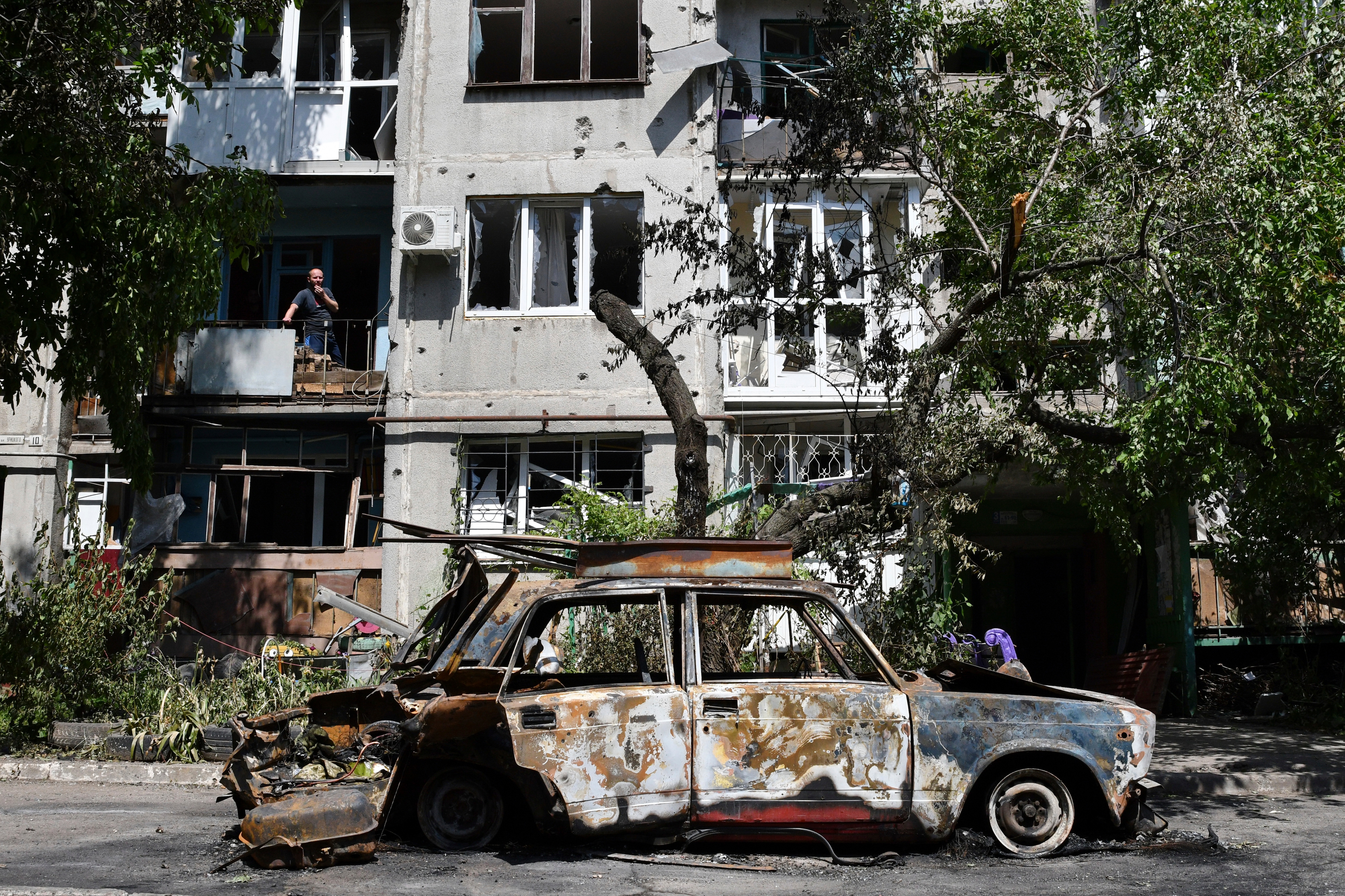 File photo: A destroyed car lies next to an apartment building damaged by an overnight missile strike in Slovyansk, Ukraine. (AP) File photo: A destroyed car lies next to an apartment building damaged by an overnight missile strike in Slovyansk, Ukraine. (AP)