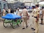 Police personnel keep vigil ahead of 'Shradhanjali Sabha' of Umesh Kolhe, who was killed for alleged social media post backing Nupur Sharma on June 21, in Amravati on Monday.