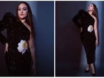 Sonakshi Sinha knows how to leave the fashion police spellbound with her wardrobe choices. Her Instagram handle has proof to back our claim. For her latest photoshoot, the Dabangg actor donned a gorgeous black one-shoulder dress with floral print detailing.(Instagram/@eficientemanagement)