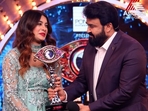 Dilsha Prasannan presented Bigg Boss Malayalam season 4's winner trophy by Mohanlal.
