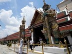 Tourists visit Grand Palace in Bangkok, Thailand. Summer travel is underway across the globe but a full recovery from two years of coronavirus could last as long as the pandemic itself.  (AP Photo/Sakchai Lalit)