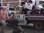 A Fourth of July parade-goer runs for cover after gunfire was heard at the parade Monday morning, in a suburb of Chicago.(AP) A Fourth of July parade-goer runs for cover after gunfire was heard at the parade Monday morning, in a suburb of Chicago.(AP)
