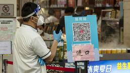 A QR code for Covid-19 contact tracing at the entrance to a store in Shanghai, China, on Saturday. (Bloomberg)
