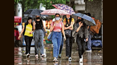 Grab chic sandals at Sarojini or head to INA market for some super cool cartoon-themed raincoats. Rainbow-inspired umbrellas, are also a big hit in Lajpat Nagar market. (Photo: Shrikant Singh/ANI) Grab chic sandals at Sarojini or head to INA market for some super cool cartoon-themed raincoats. Rainbow-inspired umbrellas, are also a big hit in Lajpat Nagar market. (Photo: Shrikant Singh/ANI)