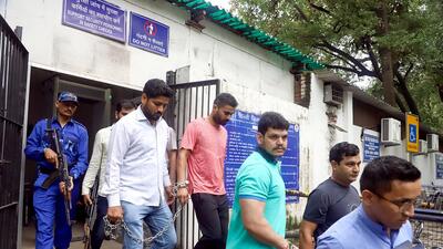 Deepak (in green) and Keshav (in pink), gang members of Lawrence Bishnoi, leave after being produced before Patiala Court in connection with the Sidhu Moosewala murder case, in New Delhi on Monday. (ANI) Deepak (in green) and Keshav (in pink), gang members of Lawrence Bishnoi, leave after being produced before Patiala Court in connection with the Sidhu Moosewala murder case, in New Delhi on Monday. (ANI)