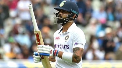 India's Virat Kohli reacts as he walks off the field (AP) India's Virat Kohli reacts as he walks off the field (AP)