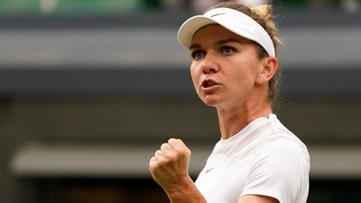 Romania's Simona Halep reacts after winning a point against Spain's Paula Badosa (AP) Romania's Simona Halep reacts after winning a point against Spain's Paula Badosa (AP)